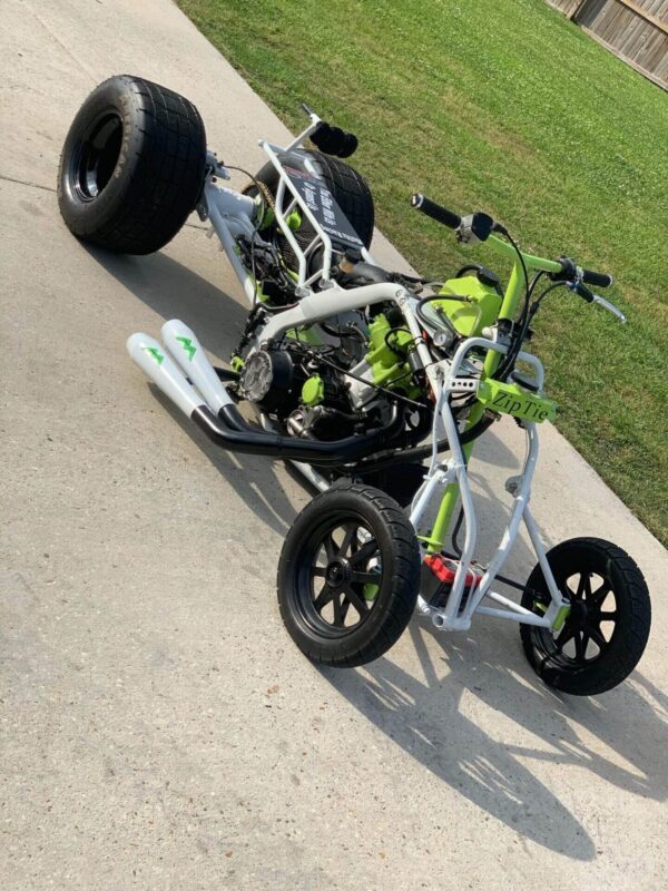 A SuiSides machine in green color on street