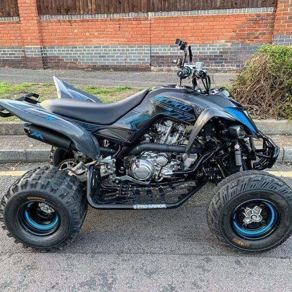 black and blue ATV